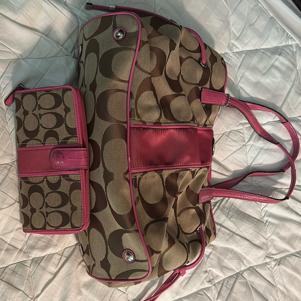 Women’s coach bag with matching wallet.